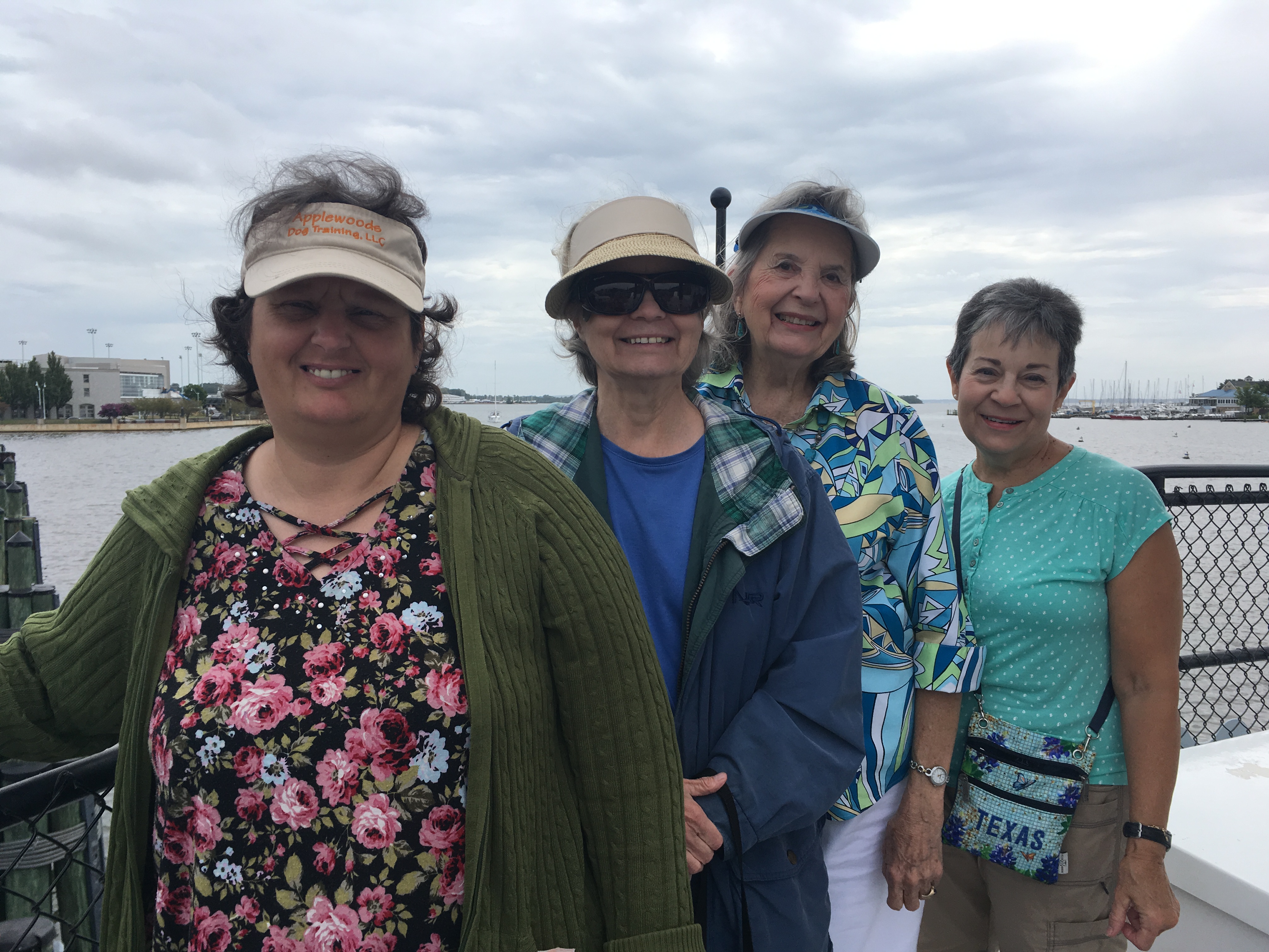 Elice and three friends at the bay waterfront