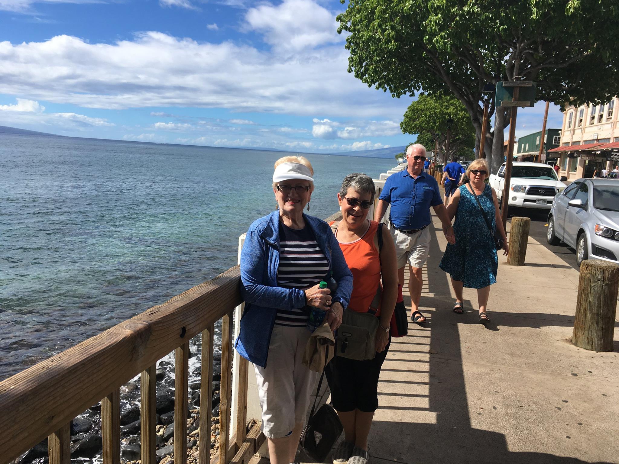 Elice on a waterfront boardwalk